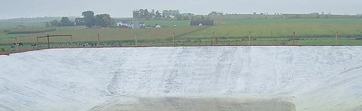 Covered manure pit built by Cloverbelt Construction on a Chippewa County farm